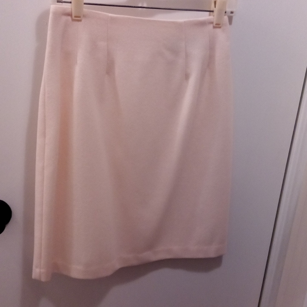 Good quality, perfect condition, classy two piece wool suit.  Ivory.